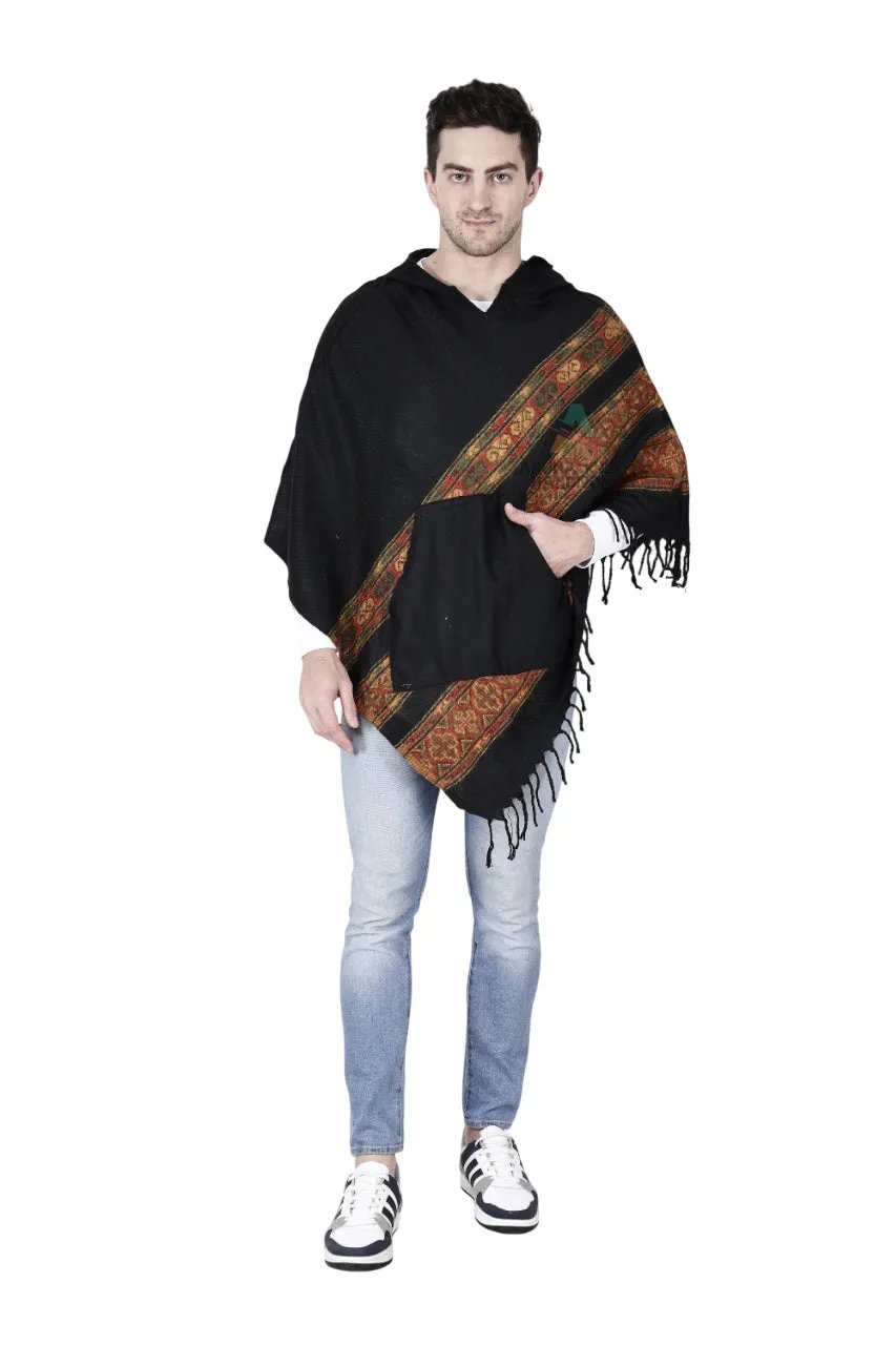 A man in light blue jeans, black and white sneakers, and an aruna kullu handloom kullu shawl woolen poncho with hood (black teen patti) stands facing forward against a white background.