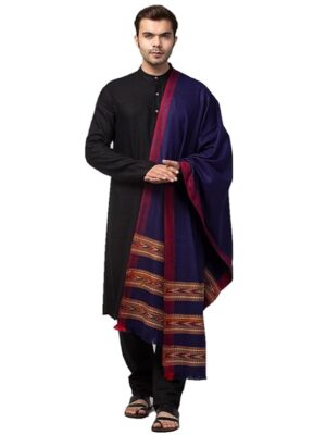 A man wears the aruna kullu handloom Men shawl Kullu Wool lohi Genuine Hand Woven for Men 3 Patti blue, draped over a black kurta pajama, standing against a white background.